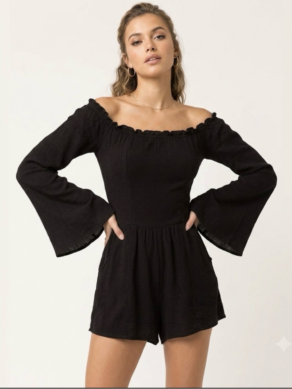 Black Long Sleeve Ruffle Neck Peplum Top